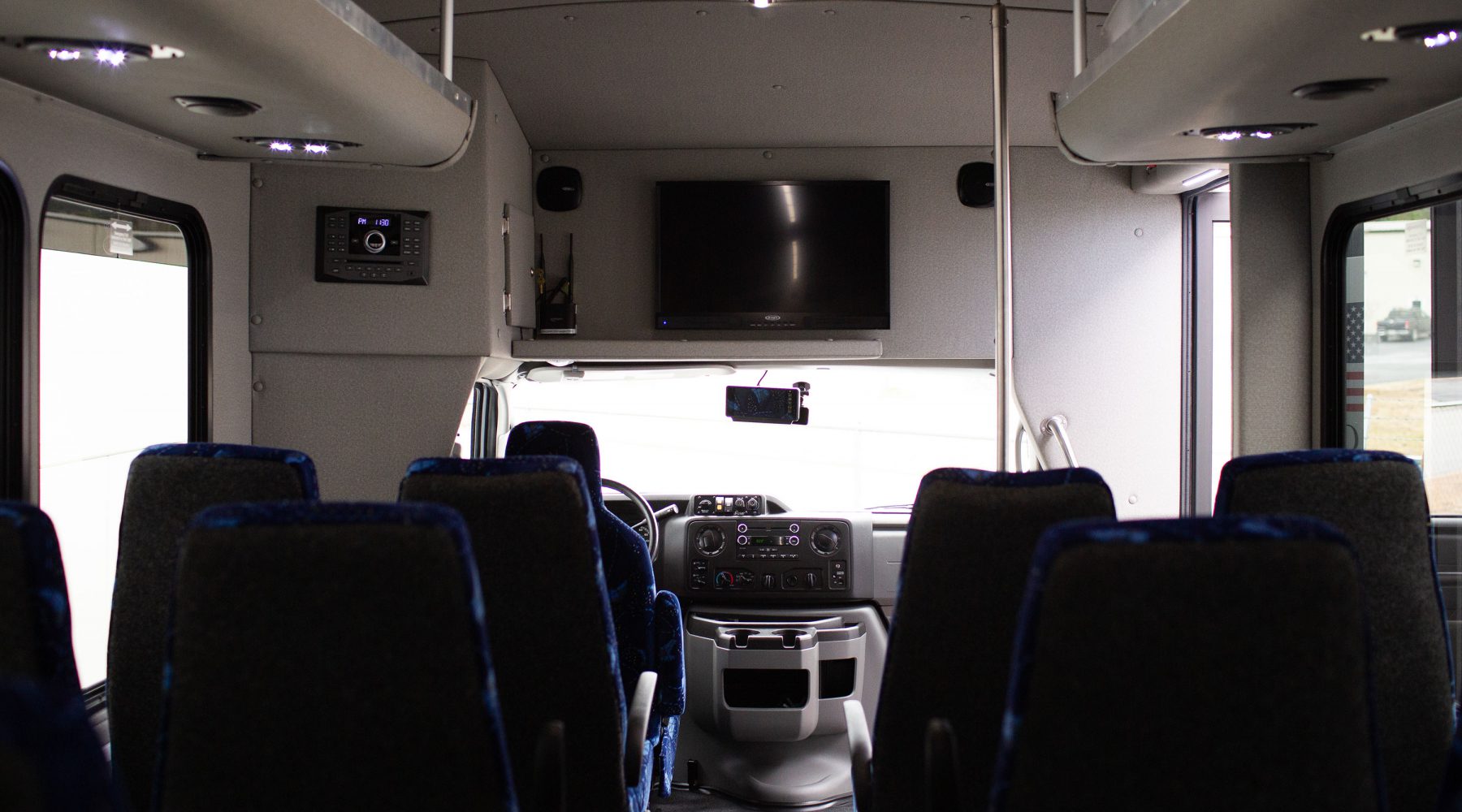 TV at the front of a bus