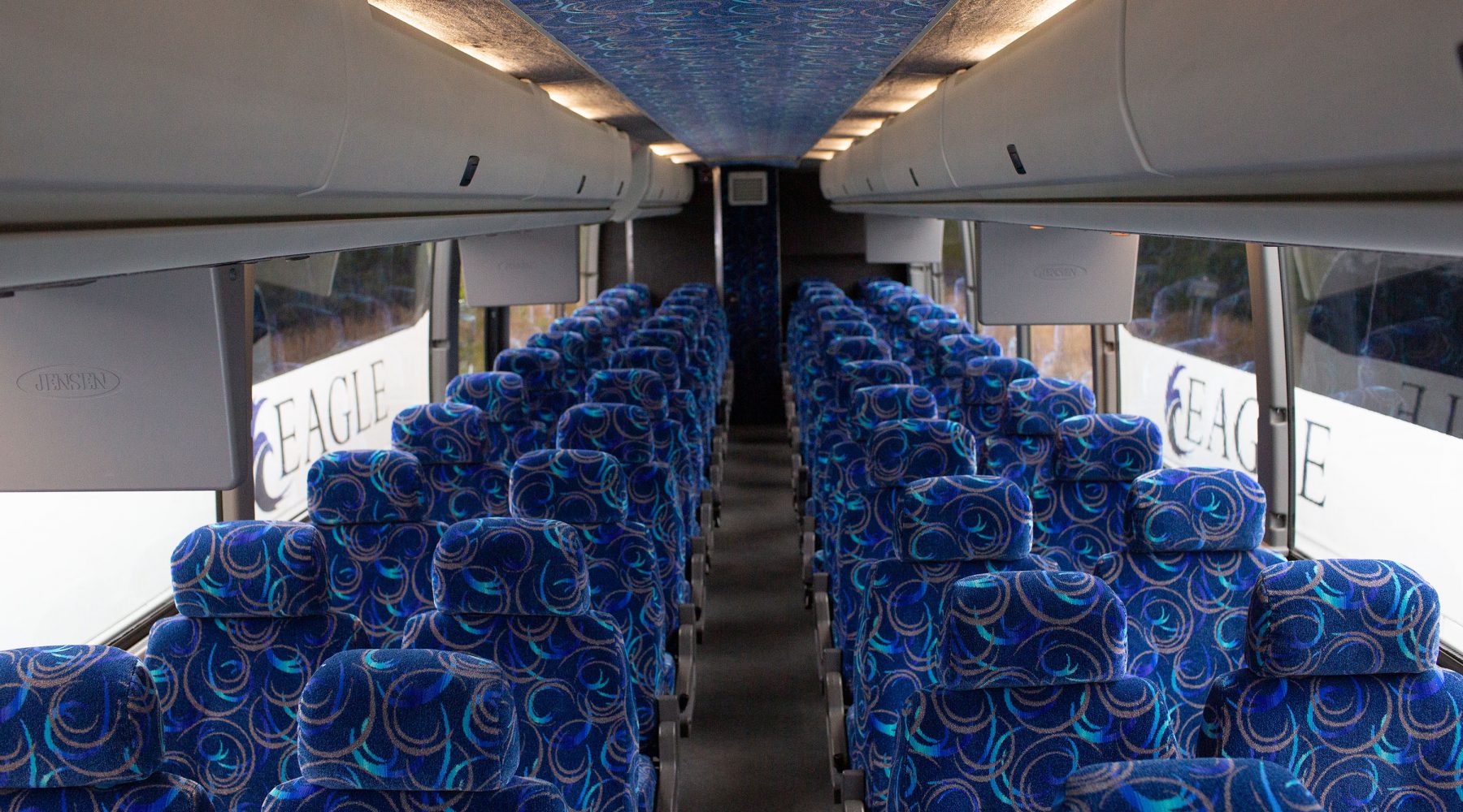 Rows of empty bus seats