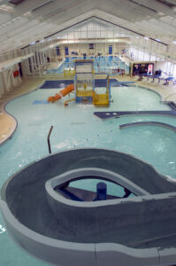 bogan park aquatic center water slide over looking water playground indoor water park